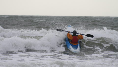 person kayaking
