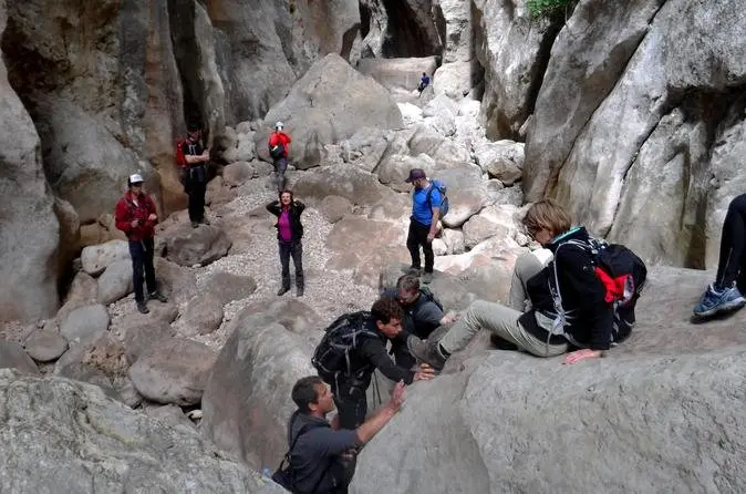People trekking on a canyon as one of their outdoor activities in Mallorca