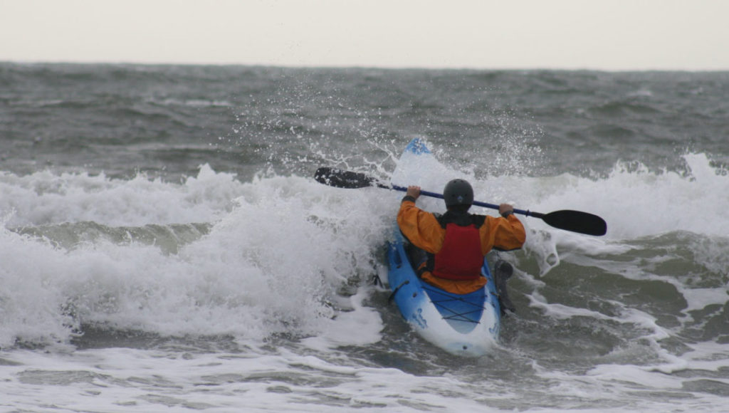 person kayaking