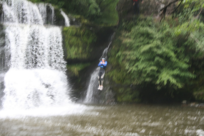 person jumping in water