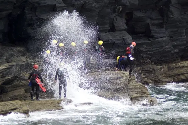 Group of individuals on an outdoor adventure in Wales