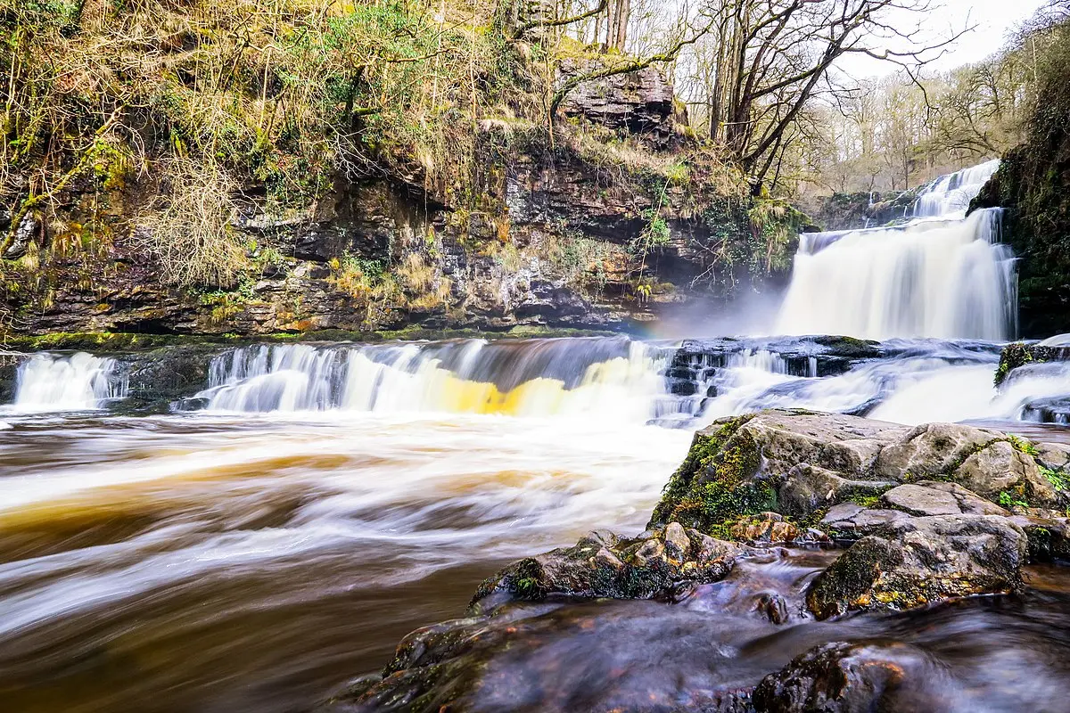 The majestic Sgwd Isaf Clun-gwyn waterfall in Brecon Beacons