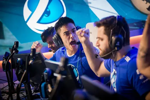 men with head phones playing games