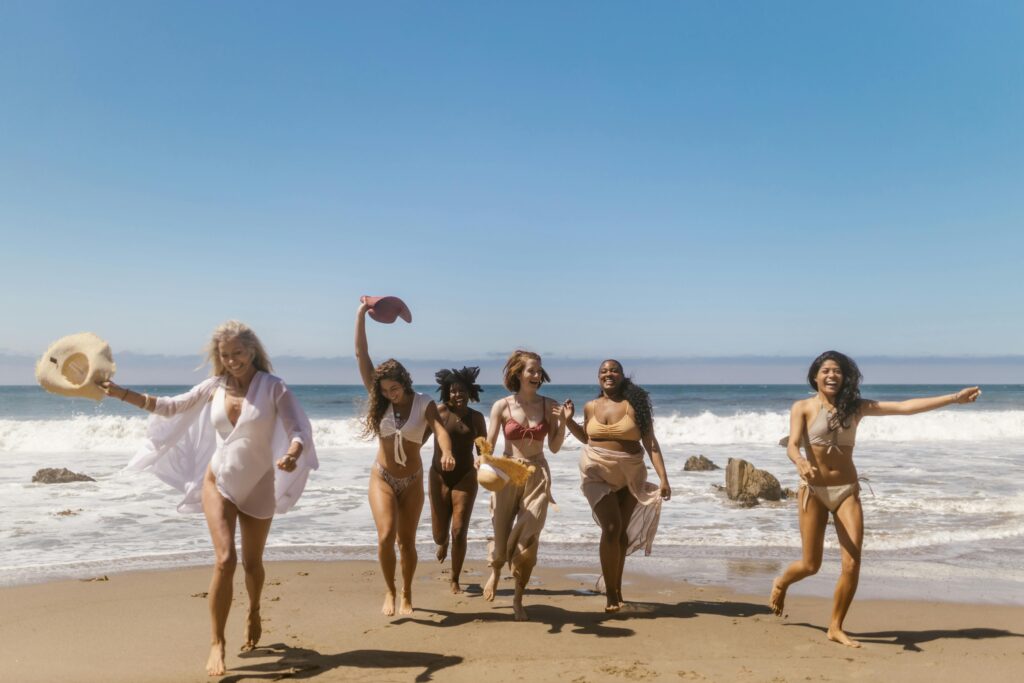 Lovely ladies celebrating a hen weekend by the beach.