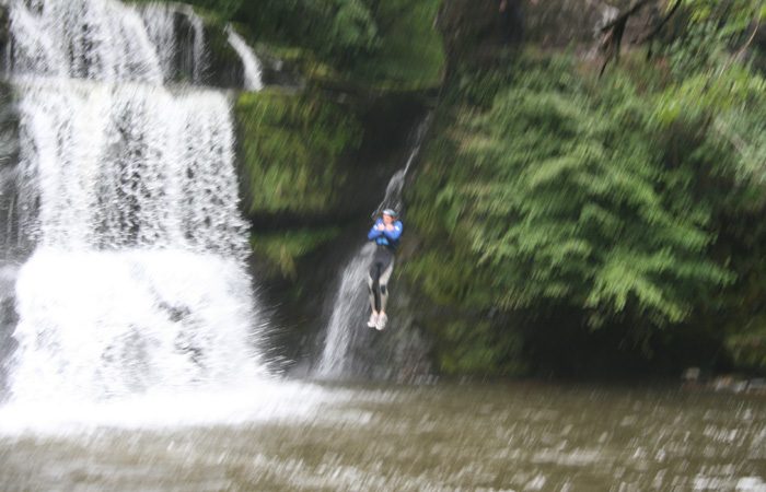 person jumping in water