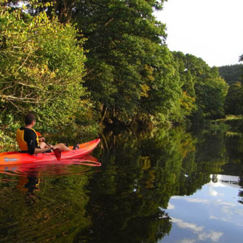 A person kayaking on River Wye
